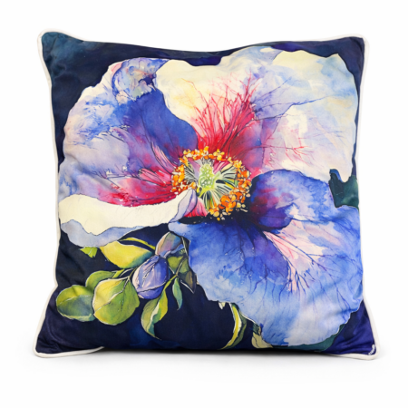 Navy scatter cushion with a bold oversized watercolor hibiscus bloom in blue, ivory, and crimson tones