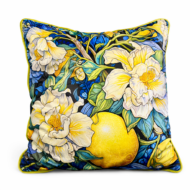 Bold scatter cushion with white lily and yellow lemon botanical print on a deep blue background with yellow piping