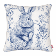 Blue and white illustrated bunny scatter cushion surrounded by delicate botanical florals
