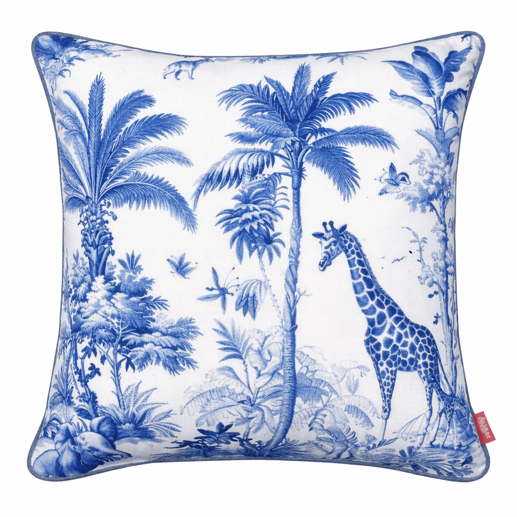 Blue and white chinoiserie-style scatter cushion featuring a giraffe among palm trees and botanical illustrations