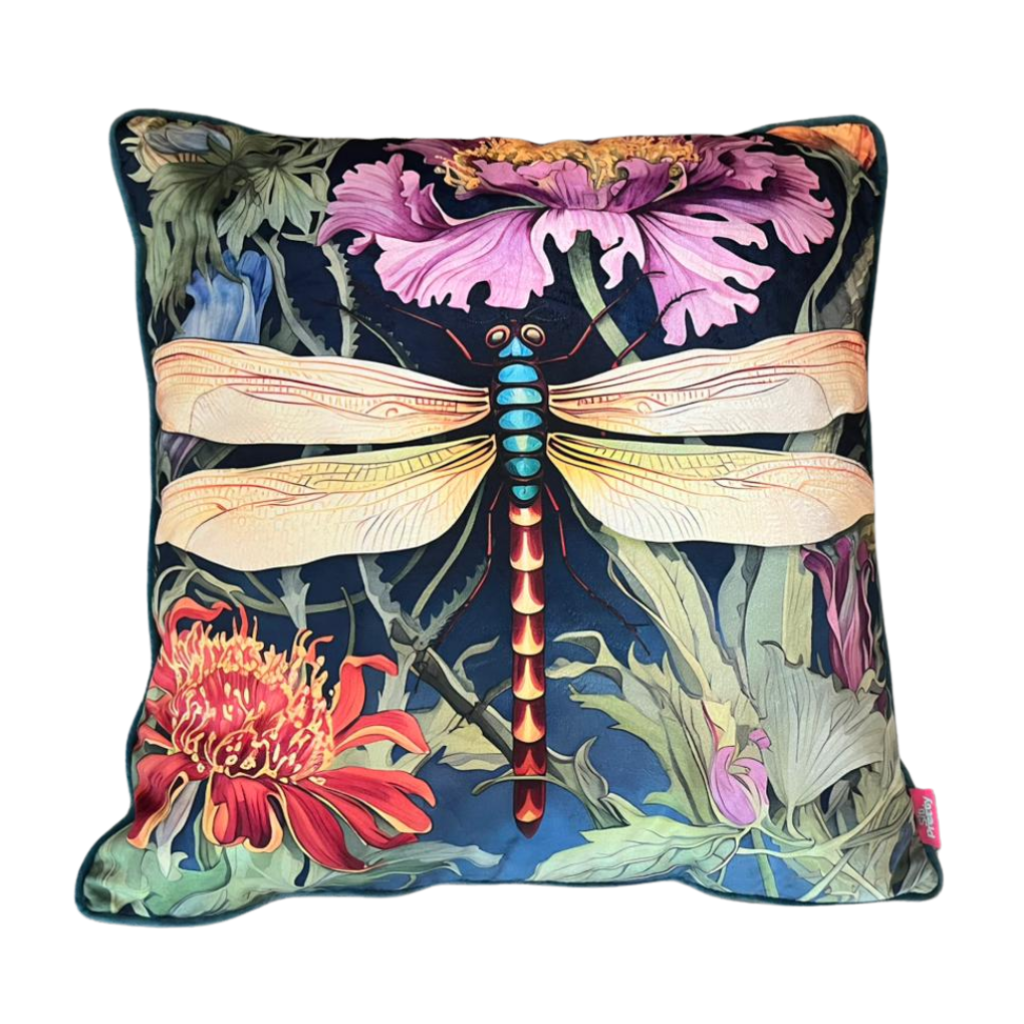 Bold scatter cushion with large dragonfly illustration in mauve and jewel tones against a moody floral background