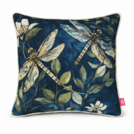 Navy scatter cushion with detailed dragonfly and botanical leaf print, finished with ivory piping