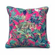 Vivid cherise pink scatter cushion with a jungle print featuring a leopard moving through tropical foliage