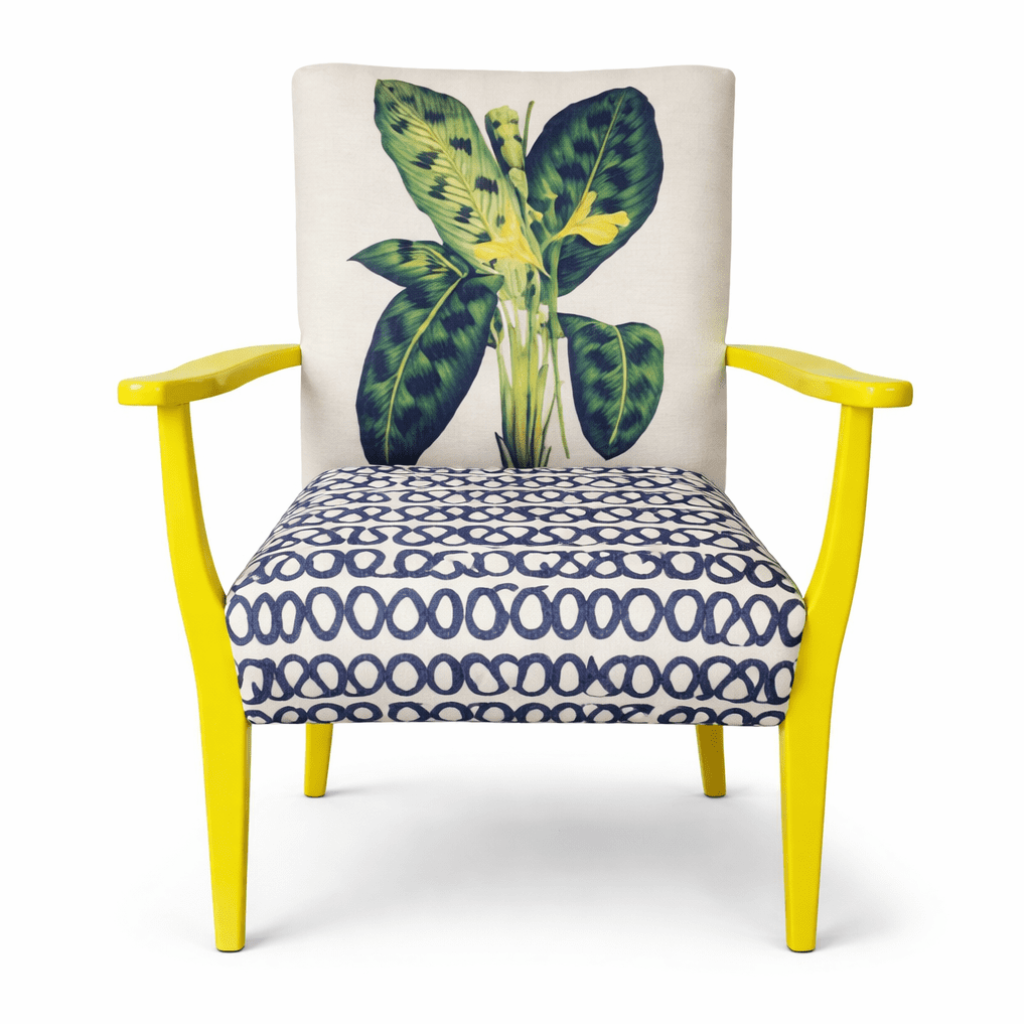 Yellow painted accent chair with a white botanical print cushion.