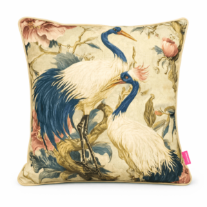 Cream throw pillow with crane bird and peony floral print design.