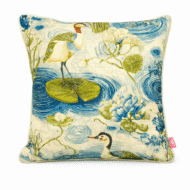 Blue and cream throw pillow with crane, lily pad, and pond ripple print design.