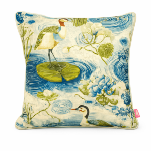 Blue and cream throw pillow with crane, lily pad, and pond ripple print design.